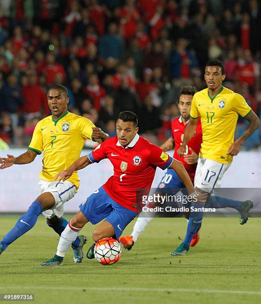 Alexis Sanchez of Chile drives the ball during a match between Chile and Brazil as part of FIFA 2018 World Cup Qualifier at Estadio Nacional on...