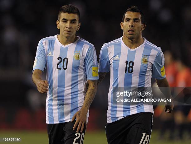 Argentina's forwards Angel Correa and Carlos Tevez are seen during their Russia 2018 FIFA World Cup qualifiers match against Ecuador, at the...