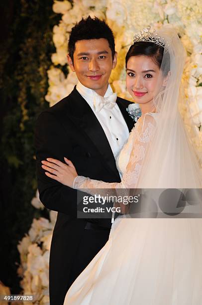 Huang Xiaoming and Anglababy during their wedding ceremony at Shanghai Exhibition Center on October 8, 2015 in Shanghai, China.