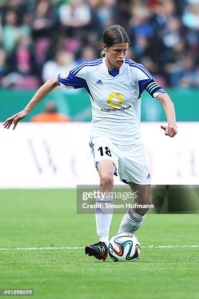 Kerstin Garefrekes of Frankfurt runs with the ball during the Women's DFB Cup Final between SGS Essen and 1. FFC Frankfurt at RheinEnergieStadion on...