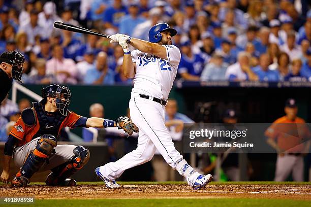 Kendrys Morales of the Kansas City Royals hits a solo home run in the fourth inning against the Houston Astros during game one of the American League...