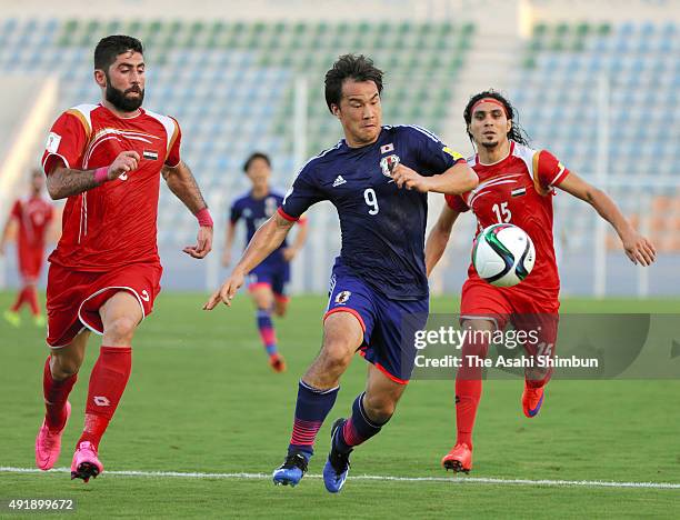 Shinji Okazaki of Japan in action during the 2018 FIFA World Cup Asian Group E qualifying match between Syria and Japan at Seeb Stadium on October 8,...