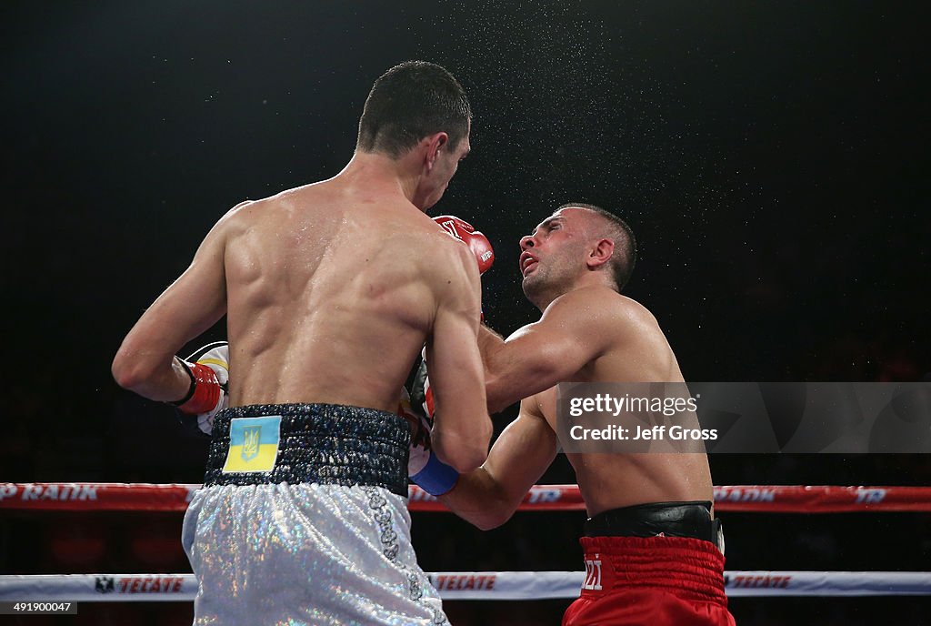 Postol Viktor Postol lands a right hand to the head of Selcuk Aydin and ...