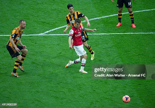 Aaron Ramsey scores the 3rd Arsenal goal during the FA Cup Final between Arsenal and Hull City at Wembley Stadium on May 17, 2014 in London, England.