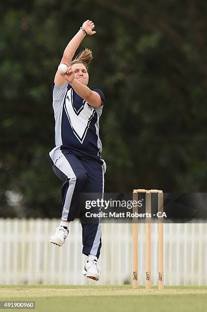 Kirsty Lamb of the Spirit bowls during the round one WNCL match between Queensland and Victoria at Allan Border Field on October 9, 2015 in Brisbane,...