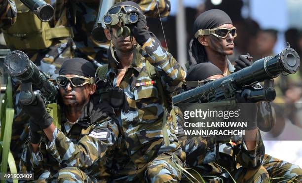 Sri Lankan army Special Force commando soldiers participate in a Victory Day parade in the southern town of Matara on May 18, 2014. The government is...