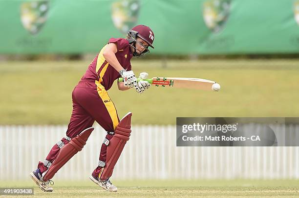 Jessica Jonassen of the Fire bats during the round one WNCL match between Queensland and Victoria at Allan Border Field on October 9, 2015 in...