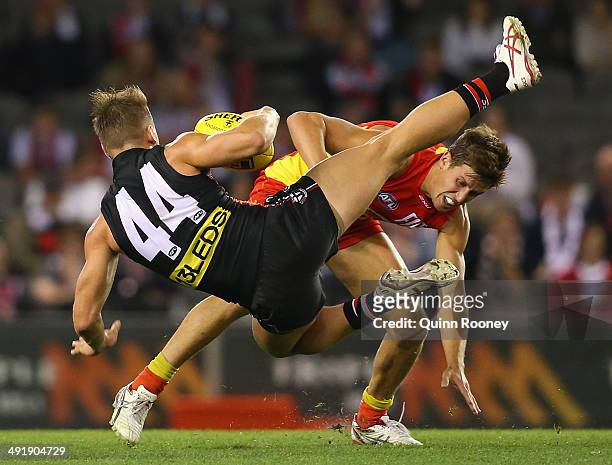 Maverick Weller of the Saints collides with David Swallow of the Suns during the round nine AFL match between the St Kilda Saints and the Gold Coast...