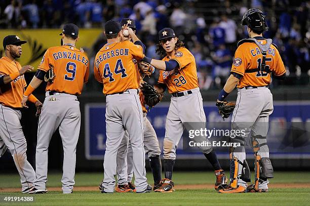 Marwin Gonzalez of the Houston Astros, Luke Gregerson of the Houston Astros, Colby Rasmus of the Houston Astros, and Jason Castro of the Houston...