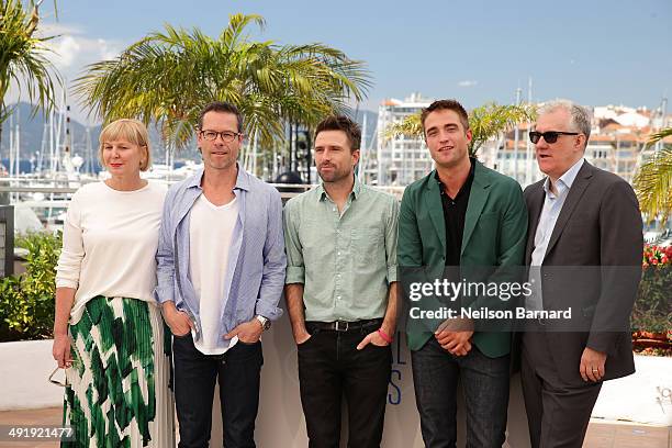 Producer Liz Watts, actor Guy Pearce, director David Michod, actor Robert Pattinson and producer David Linde attend "The Rover" photocall during the...