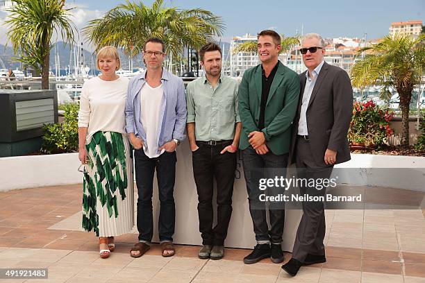 Producer Liz Watts, actor Guy Pearce, director David Michod, actor Robert Pattinson and producer David Linde attend "The Rover" photocall during the...