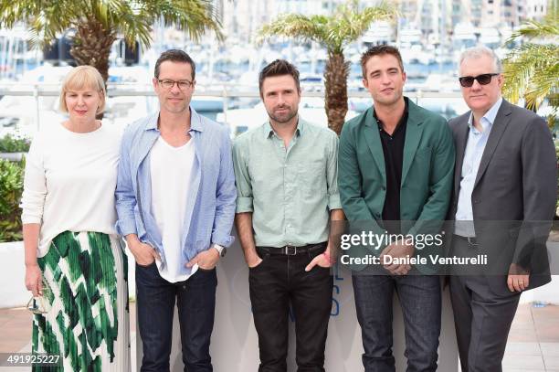 Producer Liz Watts, Guy Pearce, director David Michod, Robert Pattinson and David Linde attend "The Rover" photocall at the 67th Annual Cannes Film...