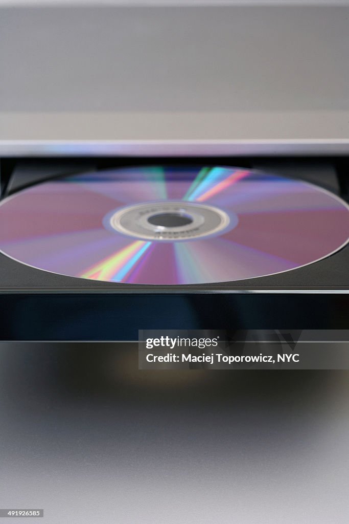 DVD disc on a player's tray.