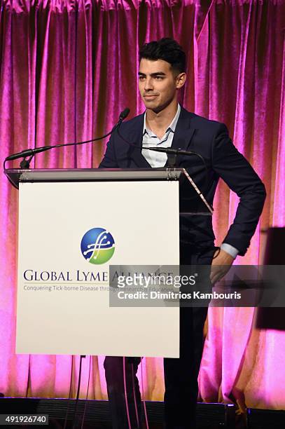Joe Jonas speaks onstage during the Global Lyme Alliance "Uniting for a Lyme-Free World" Inaugural Gala at Cipriani 42nd Street on October 8, 2015 in...