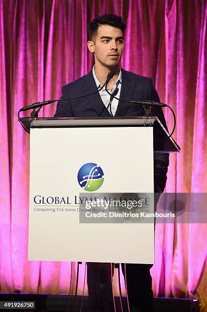 Joe Jonas speaks onstage during the Global Lyme Alliance "Uniting for a Lyme-Free World" Inaugural Gala at Cipriani 42nd Street on October 8, 2015 in...