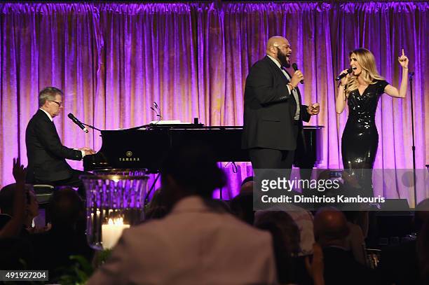 David Foster performs onstage with Ruben Studdard and Kelly Levesque during the Global Lyme Alliance "Uniting for a Lyme-Free World" Inaugural Gala...
