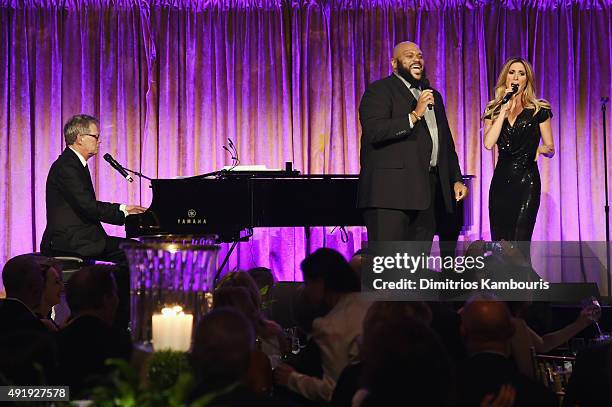 David Foster performs onstage with Ruben Studdard and Kelly Levesque during the Global Lyme Alliance "Uniting for a Lyme-Free World" Inaugural Gala...