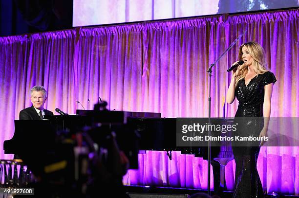 David Foster and Kelly Levesque perform onstage during the Global Lyme Alliance "Uniting for a Lyme-Free World" Inaugural Gala at Cipriani 42nd...