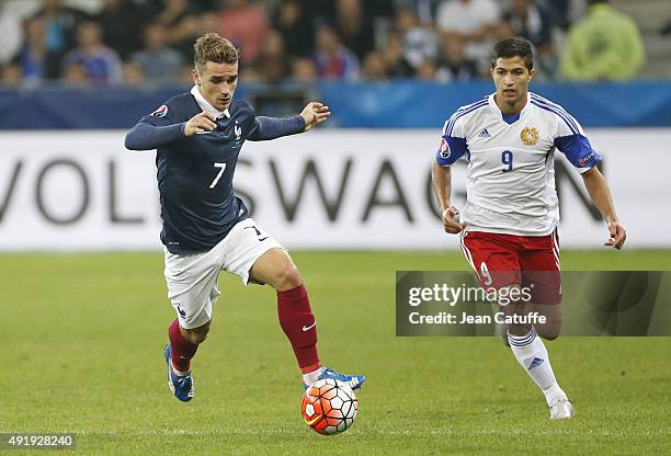 Antoine Griezmann of France and Vardan Pogosyan of Armenia in action during the international friendly match between France and Armenia at Allianz...