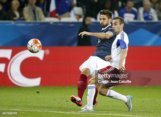 Olivier Giroud of France and Levon Hayrapetyan of Armenia in action during the international friendly match between France and Armenia at Allianz...