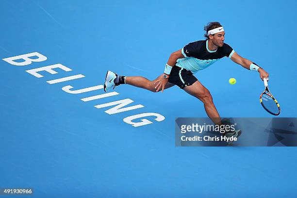 Rafael Nadal of Spain plays a forehand in his match against Jack Sock of the USA on day 7 of the 2015 China Open at the National Tennis Centre on...