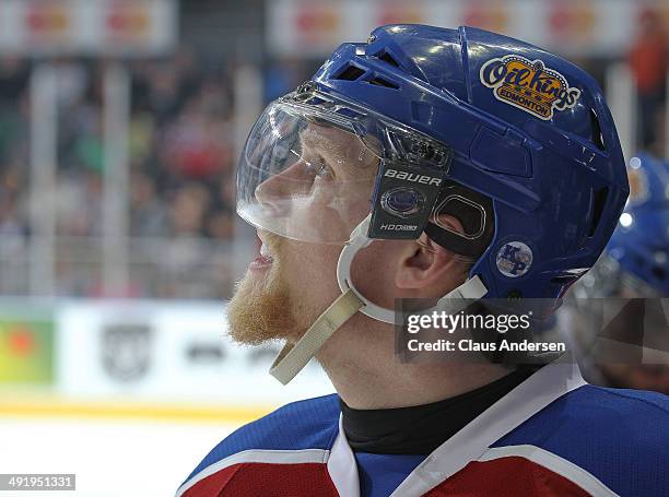 Henrik Samuelsson of the Edmonton Oil Kings checks the clock against the Guelph Storm in Game Two of the 2014 Mastercard Memorial Cup at Budweiser...