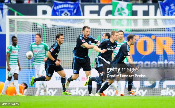 Pierre-Michel Lasogga of Hamburg and his teammates celebrate the opening goal during the Bundesliga Playoff Second Leg match between SpVgg Greuther...
