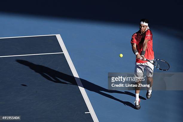 Fabio Fognini of Italy returns a ball against Pablo Cuevas of Uruguay on day 7 of the 2015 China Open at the National Tennis Centre on October 9,...