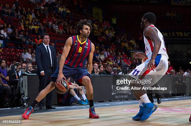 Victor Sada, #8 of FC Barcelona competes with Jeremy Pargo, #11 of CSKA Moscow during the Turkish Airlines EuroLeague Final Four third place game...