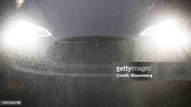 Tesla Model S automobile undergoes rain testing at the Tesla Motors Inc. Factory in Tilburg, Netherlands, on Thursday, Oct. 8, 2015. Tesla said it...