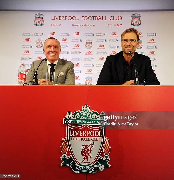 Jurgen Klopp new manager of Liverpool with Ian Ayre chief executive officer of Liverpool football during a press conference at Anfield on October 9,...