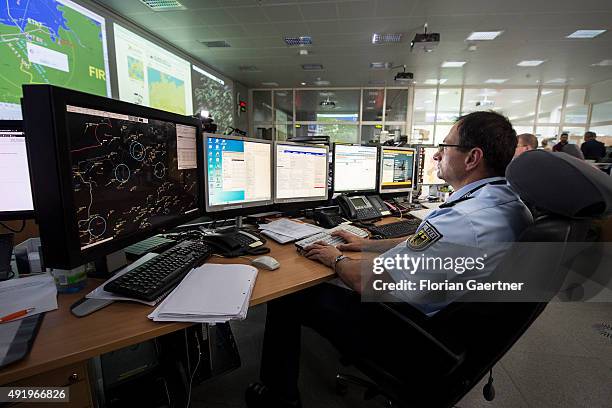 German police officer works in the Air Operations Centre on October 06, 2015 in Uedem, Germany. Here the german airspace get controlled and air...