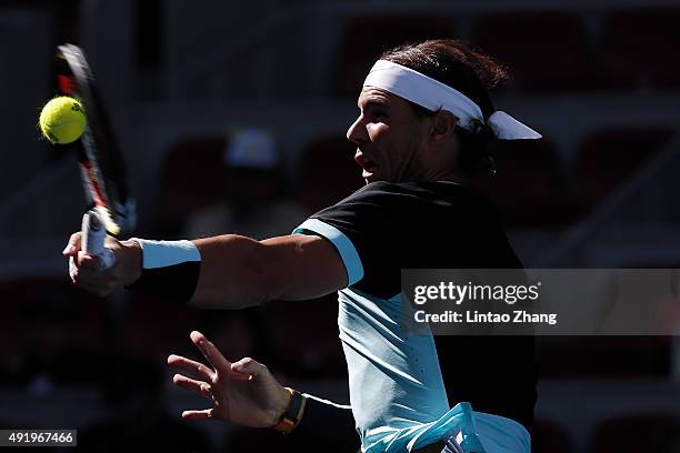 Rafael Nadal of Spain returns a shot against Jack Sock of the United States on day 7 of the 2015 China Open at the National Tennis Centre on October...