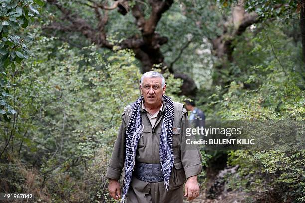 Chairman of the Group of Communities in Kurdistan and one of the founders of the Kurdistan Workers Party , Cemil Bayik also known as "Cuma", poses on...