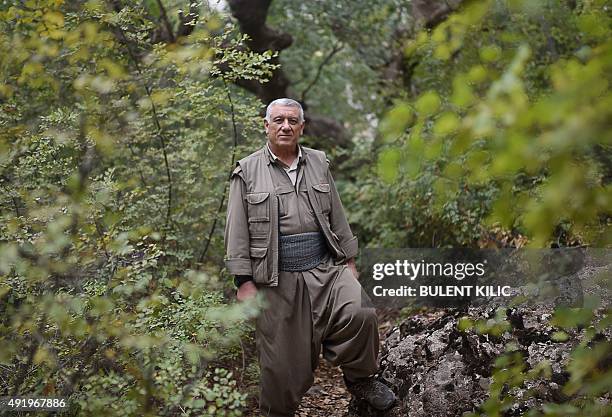 Chairman of the Group of Communities in Kurdistan and one of the founders of the Kurdistan Workers Party , Cemil Bayik also known as "Cuma", poses on...