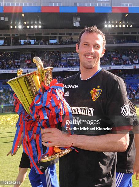 Marco Streller of FC Basel shows the Cup the Raiffeisen Super League match between FC Basel and FC Lausanne Sport at St. Jakob-Park stadium on May...