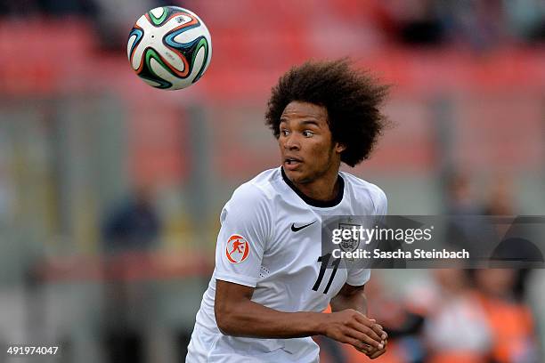 Isaiah Brown of England controls the ball during the UEFA Under17 European Championship 2014 semi final match between Portugal and England at Ta'...