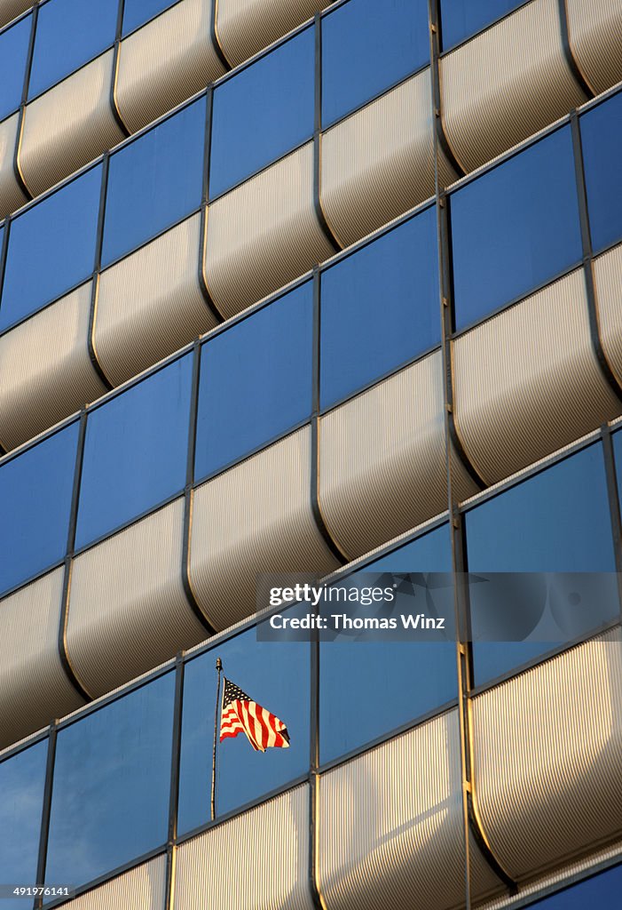 American Flag reflected in Highrise Building