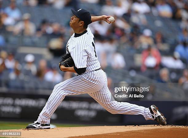 Hiroki Kuroda of the New York Yankees pitches against the Pittsburgh Pirates in the first inning during their game on May 18, 2014 at Yankee Stadium...