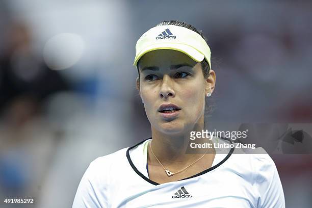Ana Ivanovic of Serbia reacts after losing the point match against Anastasia Pavlyuchenkova of Russia on day 7 of the 2015 China Open at the National...