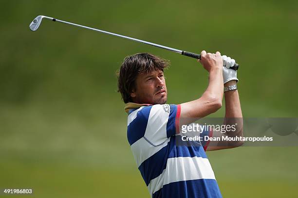 Robert-Jan Derksen of The Netherlands hits his second shot on the 1st hole during the final round of the Open de Espana held at PGA Catalunya Resort...