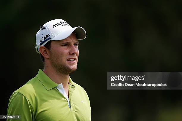 Maximilian Kieffer of Germany looks on after he hits his second shot on the 1st hole during the final round of the Open de Espana held at PGA...