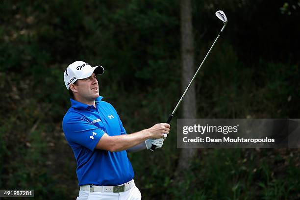 Richie Ramsay of Scotland hits his second shot on the 1st hole during the final round of the Open de Espana held at PGA Catalunya Resort on May 18,...