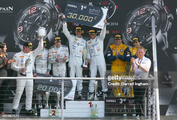 Jeroen Bleekemolen of the Netherlands and Hari Proczyk of Austria, drivers of the Grasser Racing Team Lamborghini FLII celebrate with second placed...