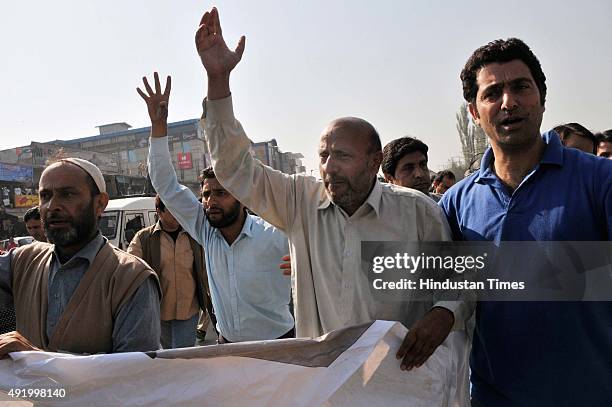 Independent Legislator Engineer Rashid shouts slogan during a protest march on October 9, 2015 in Srinagar, India. Police detained over dozen...