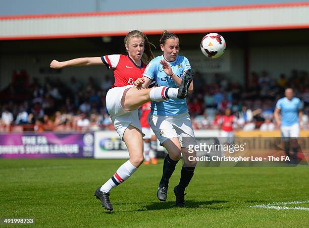Leah Williamson of Arsenal battles with Jess Holbrook of Man City during the FA Womens Super League match between Arsenal Ladies and Manchester City...