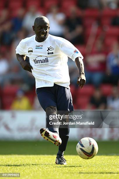 Ruel Fox of 'Super Spurs' runs off the pitch during the Football30 Elite Legends Tournament at Brisbane Road on May 18, 2014 in London, England.