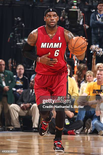 LeBron James of the Miami Heat dribbles up the court against the Indiana Pacers in game one of the East Conference Finals at Bankers Life Fieldhouse...