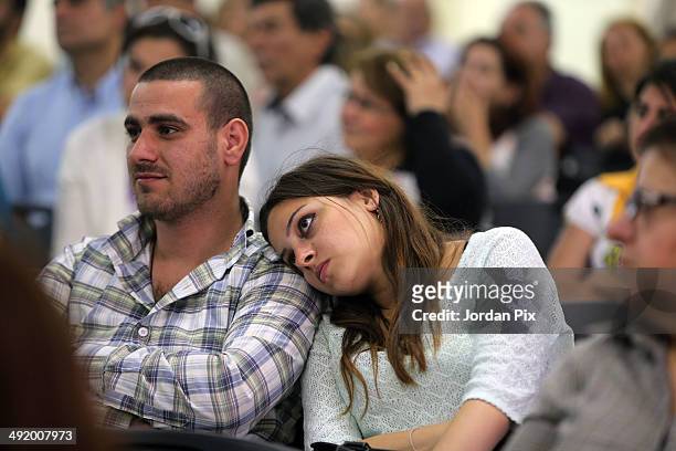 Syrian refugee couple listen as Cardinal Rodríguez Maradiaga of Honduras and President of the International Caritas, accompanied with forty...