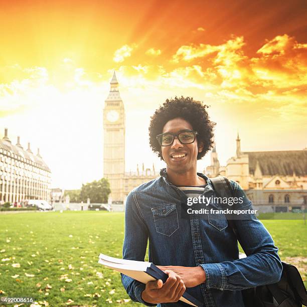 student in london - exchanging books stock pictures, royalty-free photos & images